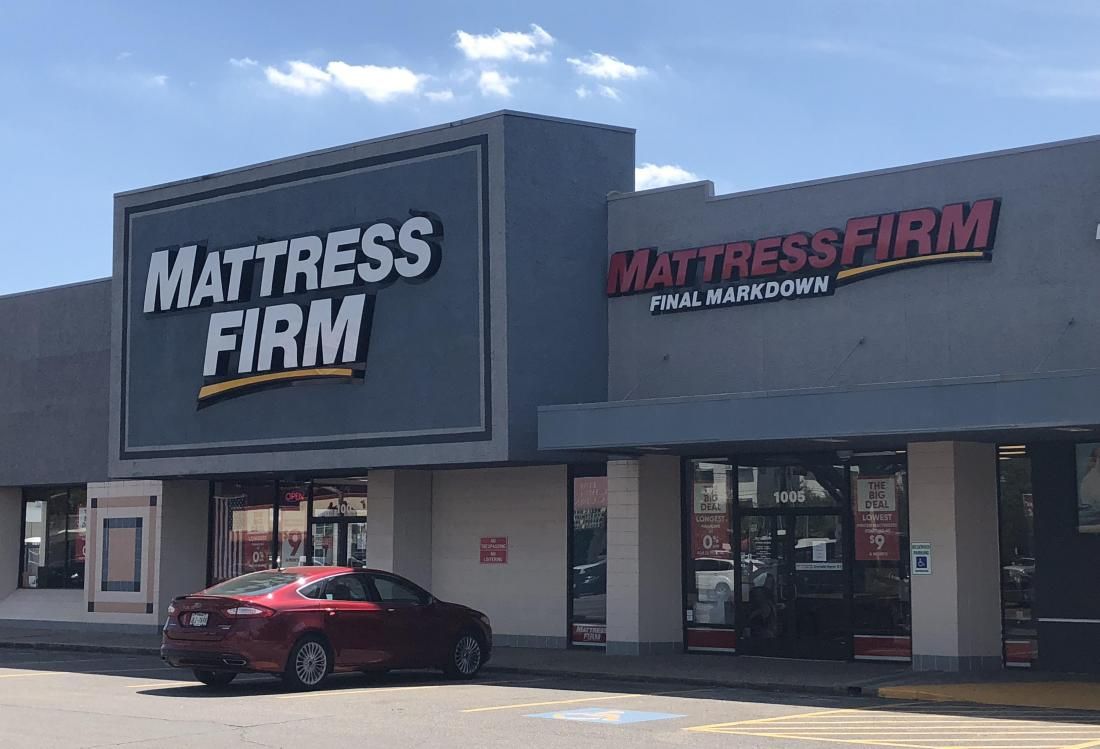 Fired Colliers Broker Says Mattress Firm Execs