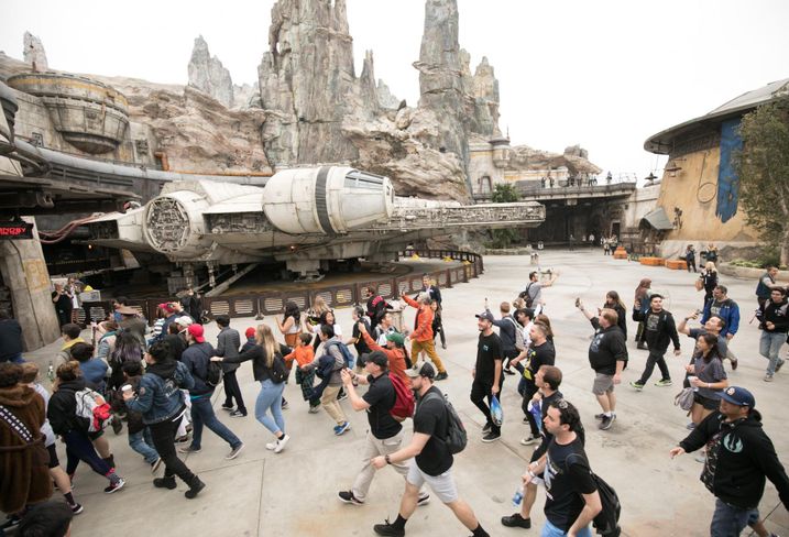 Visitors rush to ride the Millennium Falcon: Smugglers Run ride at Galaxy's Edge in Disneyland in Anaheim.
